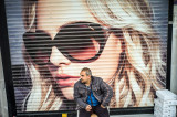 Sunglasses : A man is sitting in front of a shop, Istanbul