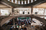 Destroyed mosques in Gaza after the last war against israel : Prays in a destroyed mosque in Gaza during the Eid al-Adha celebrations