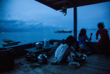 People of the Ocean : As the night falls, children finish the last bites of the dinner before going to sleep.