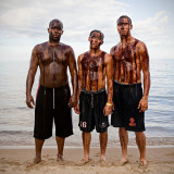 Three Friends : Crude Awakening ~  Living on the shores of Lake Michigan, I am acutely aware of the disastrous toll the oil spill in the Gulf of Mexico has taken on all forms of life, especially as our beaches opened to the 2010 swimming season. This environmental, social and economic catastrophe highlights a much larger problem that has inflicted untold suffering as we exploit the earth’s resources worldwide.  We are all responsible for leading lives that create demand for unsustainable energy. We are also all responsible for the solution and we must work together to protect the balance of life.