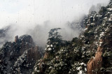 Mount_huangshan 3 : China's World Cultural and Natural Heritage Double: Huangshan,Snow just stop, the snow-covered Huangshan very beautiful, even through ice and fog droplets with Xue altitude cable car glass, it also allows you surprised glass scratches and dirt on the window does not appear to affect the beautiful. Huangshan is a unique natural and cultural products, high-altitude Tram glass of ice and water droplets can be considered beautiful, but separated by glass Huangshan overall look is not clear, it is...