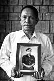 Our Gurkhas : Retired staff sergeant Bhabhindra Bahadur Malla holding a photograph of himself in uniform just before his retirement. The 67-year-old served from 1960 till 1984.