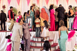 Addis in Motion: Street Photography from Ethiopia : Guests rush to meet the bride and groom at a wedding reception in Addis Ababa.