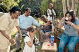 Addis in Motion: Street Photography from Ethiopia : A family meets for relaxed Christmas lunch in Addis Ababa.