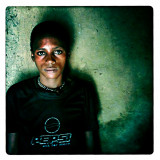 5 - AVAISI - from a series the RELUCTANT sex workers : ‘I sleep on the earthen floor with my young children.  Some days I have no money to buy food, we go to bed hungry.  I am resigned of the world of poverty and AIDS”  AVAISI  26, widowed, 2 children, HIV/AIDS+