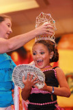 Mary's Pageant :  Mary Brunner, age 8, being crowned as the Ultimate Glitz winner at the Big Top Pageant at the Holiday Inn in Harrisburg, Pennsylvania on August 12, 2012.  Mary has been competing in pageants since she was five.