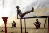 Indian Wrestler : Indian wrestlers exercise in Varanasi, India, March 06, 2010. Kushti is traditional Indian wrestling. It’s not just a sport art, it’s an ancient subculture. Wrestlers live and train together, have their strict rules. They may not drink, smoke and have sex. Their life must be pure. Kushti wrestlers live in gyms called akhara. Their diet consists of milk, eggs, almonds and home made bread called chapatis. Indian traditional wrestling is very popular for keeping strong and healthy body.