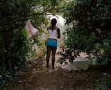Dona, a Nigerian sex worker stands by her makeshift bed on the fringes of Rome : Dona, a Nigerian sex worker stands by her makeshift bed on the fringes of Rome