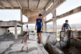 Albania- the future after the comunist regim : Shkodra in the northern Albania. There is no future for us, says 11-year-old Gentian Ndou.  In the ruins of an old steam factory, which was built during the communist regime, which employed hundreds of Albanians. Now it´s used only by Gentian Ndou and his friends to play hide and seek in.